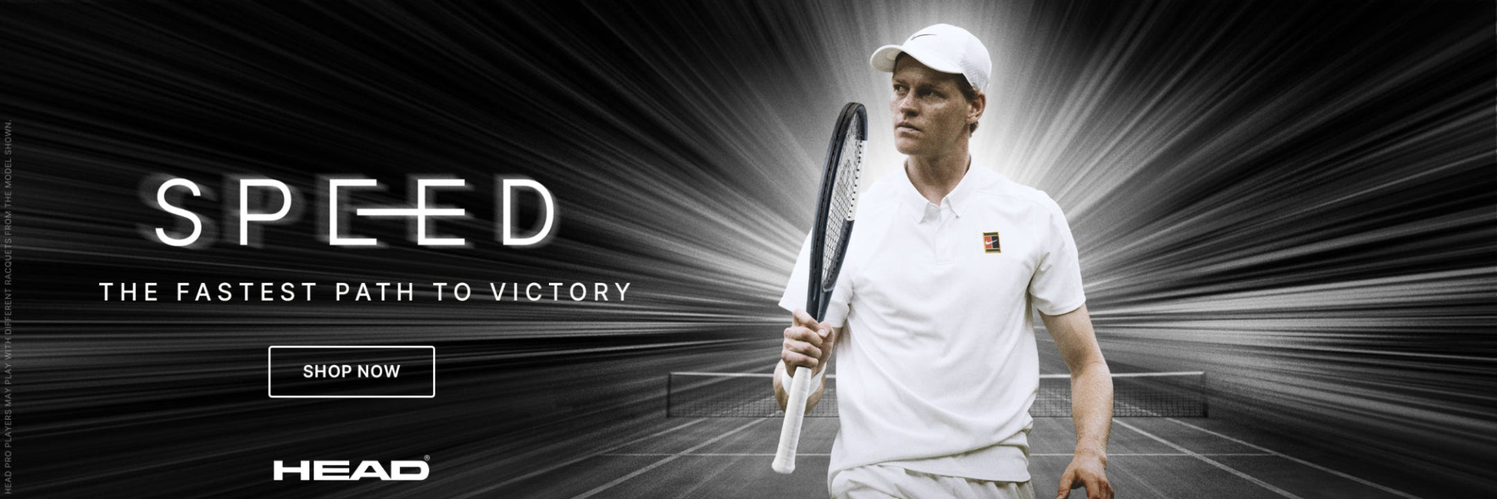 Tennis player holding a racket with 'Speed' and 'HEAD' branding on a dark background